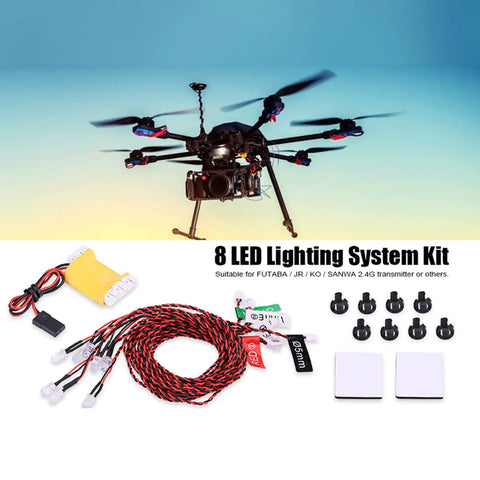 8 Piece RC LED Light Kit For Airplanes And Helicopters With 23 6 Inch Cable Full Aircraft Lighting System Flashing Landing Gear And Wing Lights For RC Models Universal Fit For Various Transmitters next to a flying drone with lights on.