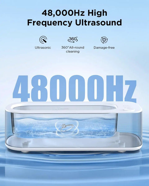 Ultrasonic Jewelry Cleaner Machine With 48KHz Tech Dual Cleaning Modes 350ML 304 Stainless Steel Tank Safe For Jewelry Eyeglasses Rings Watches Watch Bands Dentures Great Gift For Wife Mom Daughter, displayed with water waves inside the 350ml tank.