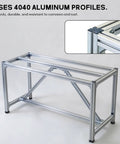 Badass Rock Solid Heavy Duty Aluminum Work Table With Thick Wood Top And Tough Utility Workbench For Garage Workshop Kitchen Prep And Commercial Packing Rack showcasing sturdy 4040 aluminum profiles.