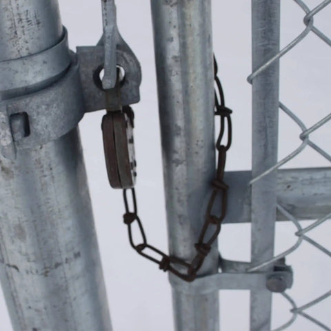 Close-up of Heavy Duty 1 3/8 Inch Chain Link Fence Gate Post Hinge Set Built Tough Galvanized Carbon Steel 4 Pack For 32mm Pipe Panels Male And Female Hinges Max Load 220 Lb Fits 1 3/8 Inch Posts Easy Install showing chain and hinge installed