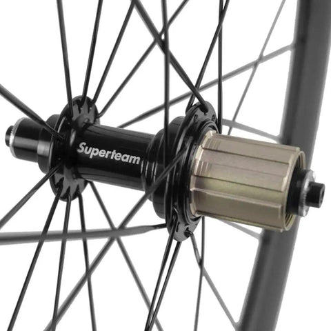 Close-up of Superteam hub on 50mm And 23mm Carbon Road Wheelset 700c Clincher Front And Rear For Shimano 8 9 10 11 Speed