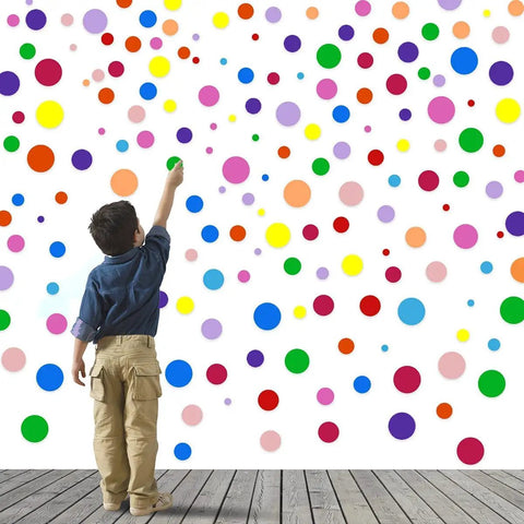 Child reaching up to 264 Piece Polka Dot Wall Decals Set Colorful Vinyl Circle Dots for Walls Perfect for Kids Bedrooms Nurseries Playrooms and Classrooms 7 Sizes 12 Bright Colors Easy Peel And Stick Stickers on wall