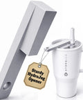 One Hand Tumbler Lid Opener With Ergonomic Lever Universal Fit For 20oz To 40oz Insulated Tumblers Like Stanley Hydrojug And Owala No Fuss Easy Grip Assisted Bottle Opener For Weak Hands Grey next to a white Hydrojug cup