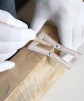 Pros Swear By This Precision Dovetail Marker And Scribing Gauge For Fine Woodworking Shops Featuring Rock Solid Brass And Stainless Steel Build That Lets You Bang Out Perfect Joint Angles Effortlessly Every Time. A hand uses the gauge to mark wood.