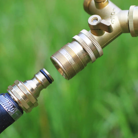 Close-up of Solid Brass Garden Hose Quick Connect Kit Three Quarter Inch GHT Threaded Fittings during installation.
