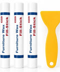 Quick Fix Wood Filler Sticks 3 Pack that Smooth Out Scratches Like A Charm with a yellow scraper tool.