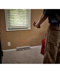 Person using 10 To 1 Infrared Temperature Gun With Easy One Hand Operation Durable Construction Quick Temperature Readings For HVAC Plumbing And Electrical Work Handheld Red Tool For Accurate Surface And Appliance Temps on air vent at home