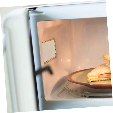 Microwave interior with 10 Pack Microwave Waveguide Mica Sheets Heat Resistant Insulation Covers Fireproof Shield installed.