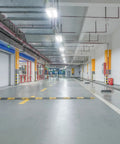LED High Bay Shop Light Two Pack 150W 21000 Lumens 5000K Daylight 100 277V illuminating a large commercial indoor space