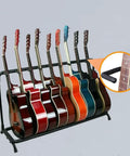 Pipe Insulation Foam Tubing One Inch Inner Diameter Six Feet Long Rubber Foam Insulation on guitar rack with multiple guitars.