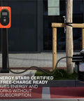 Top Tier Level Two Electric Vehicle Charger Delivers Hella Fast 48 Amp 11point5 Kilowatt Power With A Slick Screen Interface J1772 Connector And Long 25 Foot Heavy Duty Cable Built For Commercial Parking Lots Or Home Garages in outdoor setting with vehicle plugged in.