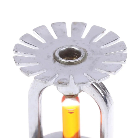 Close-up of a Four Pack Built Tough Automatic Fire Sprinkler Head with Quick Response Thermal Bulb and copper threads.