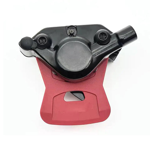 Red 4 Pack Disc Brake Pad Spacer Hydraulic Spreader Insert Set for SRAM Road and MTB Brakes shown under a caliper.