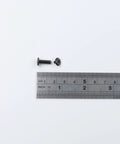 20 Sets M3x12mm Black Furniture Bolts And Nuts Kit with ruler for size reference.