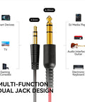Dual jack design of wired over ear studio monitoring headphones with 3.5mm and 6.35mm adapters for various devices.