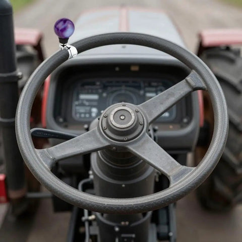 Purple Power Steering Wheel Knob Spinner Turn Aid Grip For Tractors Forklifts And Lawn Mowers on a tractor steering wheel.
