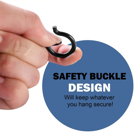 Close-up of hand holding 30 Pack Q Hanger Hooks With Safety Buckle Windproof Screw Hooks for hanging outdoor decor.