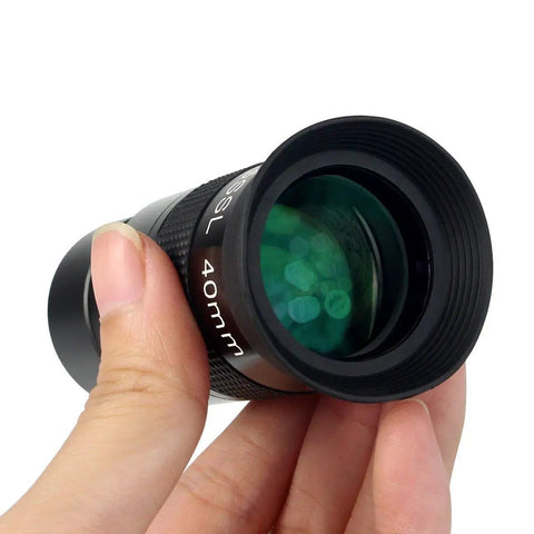 Close-up of 40mm Plossl Eyepiece For Telescopes 1.25 Inch Dope Optics with Fully Multi Coated glass held in hand
