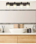 Vintage Farmhouse Bathroom Vanity Light Fixture In Oil Rubbed Bronze Reversible 4 Light Design That Mounts Up Or Down For Warm Rustic Bath Glow And Classic Retro Modern Vibe above a sink