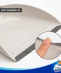 Close-up of Grab And Go Mini Dustpan with Bamboo Handle showing soft rubber lip for surface protection, 1 Set.