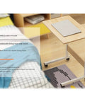 Height Adjustable Mobile Laptop Desk Sets The Chill Vibe For Remote Work Sessions While Rolling On Slick Casters And Locks Down Tight For Ultimate Stability, with wooden top and wheels.
