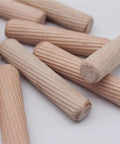 Pro Grade 900 Pieces Wooden Dowel Pins Kit For Woodworking Doweling Jig Set Round Fluted Wooden Plugs Pins And Rods Locator Furniture Fittings In 6mm And 10mm Sizes Handy For Crafts And DIY Projects close-up of fluted hardwood dowel pins