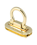 Close-up of gold ring-style turn lock clasp for handbags and purses