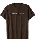 Solid Men's Lightweight Graphic Tee Featuring Bold I Like Rickshaws Typography Classic Fit Cotton Streetwear For Hella Comfort And Dope Daily Threads displayed on a brown background.