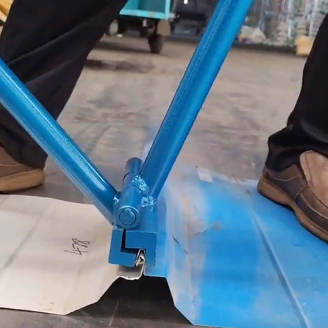 Using Pro Grade Standing Seam Roof Hand Seamer 475 Heavy Duty 2 In 1 Sheet Metal Bender on a standing seam panel, close-up view.