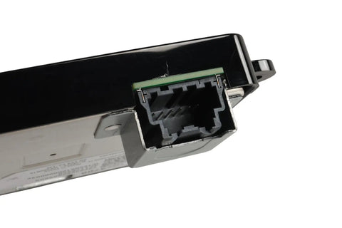 Close-up of the connector side of Slick Wireless Charging Module For Modern Rides Hassle Free Accessory Pad 13563706.