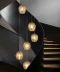 Dimmable Glass Globe Pendant Light Fixture With Champagne Finish, Modern LED Hanging Lamp over spiral staircase