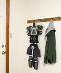 Portable Hockey Gear Drying Rack with five sturdy hooks hanging pads and helmets indoors