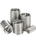 Pro Grade Stainless Steel Helical Thread Repair Insert Kit with multiple sizes for damaged threads in a stack showcasing secure grip.