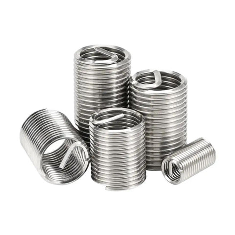 Pro Grade Stainless Steel Helical Thread Repair Insert Kit with multiple sizes for damaged threads in a stack showcasing secure grip.