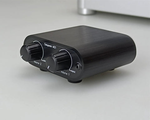 Two Channel 3.5mm Stereo Mini Headphone Mixer With Dual Inputs And 3.5mm Aux Output, front view showing volume knobs.