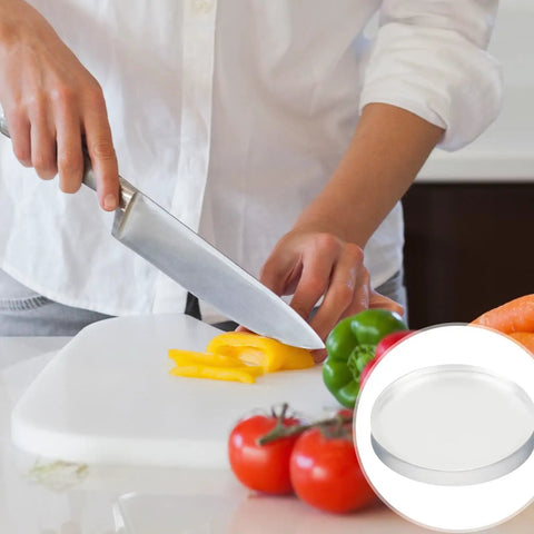 Heavy Duty Adhesive Non Slip Bumper Dots For Glass Tables And Cabinets Provide Dang Good Grip While Keeping Furniture Straight Up Safe From Daily Scratches And Slipping Hazards. A close-up of a chef slicing yellow bell peppers on a cutting board with fresh vegetables visible.
