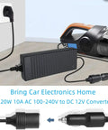 High Output AC To DC Converter 100V To 240V To 12V 10 Amp 120 Watt Plug And Play Power Adapter connected to a car vacuum.