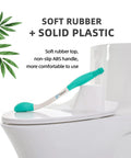 Long Reach Toilet Aid For Easy Wiping with soft rubber head and solid plastic handle shown on toilet seat