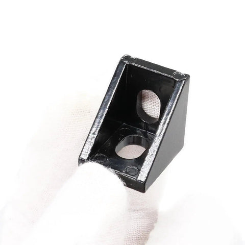 Close-up of a black heavy-duty Ten Pack 20mm Aluminum T Slot Corner Bracket for 90 Degree Joins with M5 Bolts and Nuts.