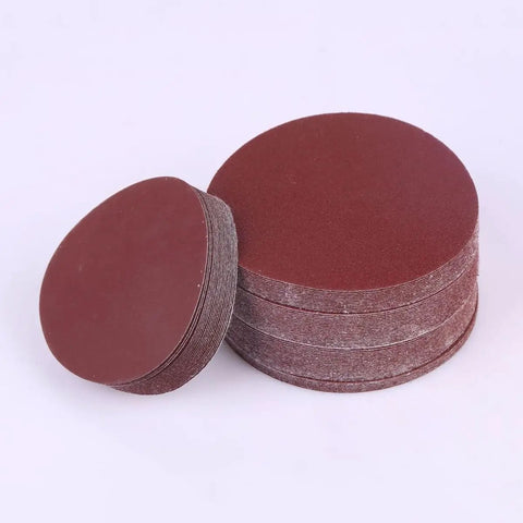 Get This Awesome 100 Piece 7 Inch Hook And Loop Sandpaper Disc Set With Grits From 60 To 1000 For Wet Or Dry Sanding Projects And Polishing That Gets The Job Done Smooth And Quick Every Single Time. Round 7 inch sandpaper discs stacked with hook and loop backing.