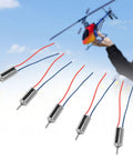 Five Pack Mini Coreless DC Motor 4 Point 5V 32250 RPM For RC Planes shown with wires and helicopter background