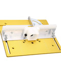Top Notch Aluminum Alloy Shank Router Bit Set Paired With Precision Router Table Insert Plate And Heavy Duty Router Lift System For A Plug And Play Workshop Upgrade Shop Ready Workhorse Gold Finish showing a gold insert plate with adjustable fence.