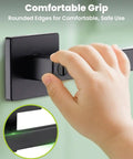 Child gripping matte black keyless privacy door lever with lock set, square design, for bedrooms and bathrooms, ANSI certified.