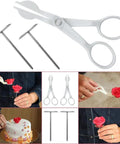 Rose-shaped cake decoration held with scissors from All In One Cake Decorating Starter Kit With Non Slip Turntable Leveler And 82 Piece Baking Gear Including Piping Tips Icing Bags Spatulas Scrapers Fondant Tools For Cupcakes And Cookies.