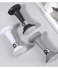 Ditch The Drill Grab This Gray Silicone Magnetic Door Stopper With Anti Collision Catch Holder shown in black, white, and gray colors.