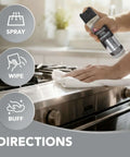 Using Stainless Steel Cleaner and Polish Spray Aerosol 2 Pack for Appliances, Chrome, and Sinks on a stove.