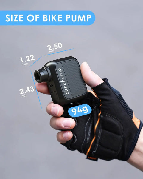 Hand holding Pocket Sized Electric Bike Pump With 100 PSI, Ultra Portable Road Bike Tire Inflator, showing dimensions and weight