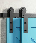 Close-up of I Shaped Bypass Sliding Barn Door Hardware Track Kit With Bent Hanger System Black 9FT 2740mm Anti Jump Rollers