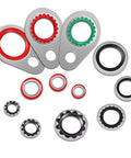 XBVV 95-piece, 12-size automotive A/C compressor gasket and seal kit with red, green, and black rings on metal backing plates