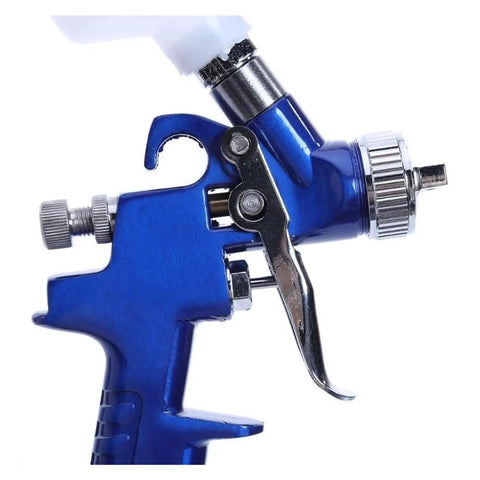 Premium Mini Paint Sprayer With Slick Adjustment Knobs And Hassle Free Setup For Rapid Car Detailing And Smooth As Glass Coatings close-up of blue pneumatic airbrush trigger and adjustment knob.